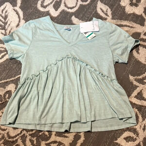 Love fire top. Short sleeves. New. Size large. Mint green. Soft. Stretchy.